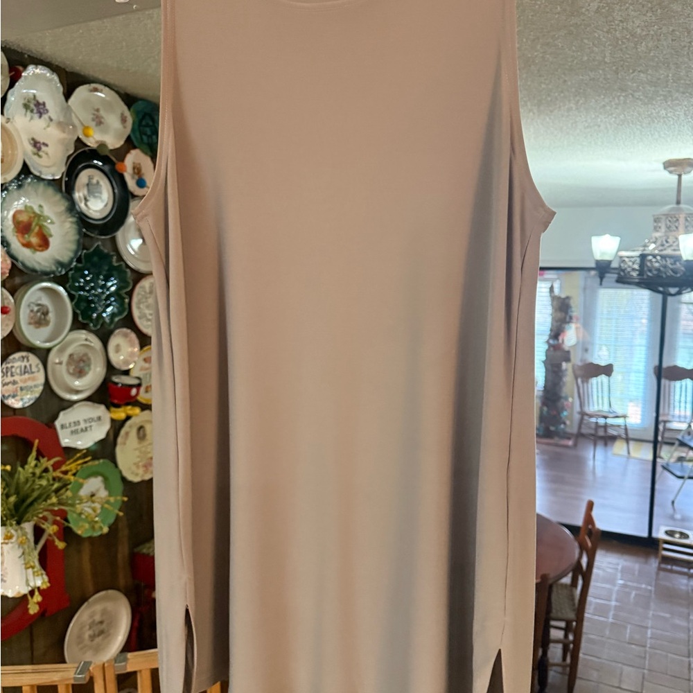 Sleeveless Beige tunic.